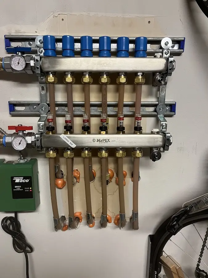 Plumber performing Water Heater Repair at a residential property in Post Falls